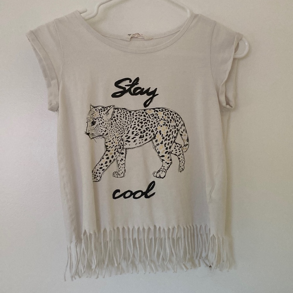 H and M Girls Stay Cool cheetah shirt with fretted ends.